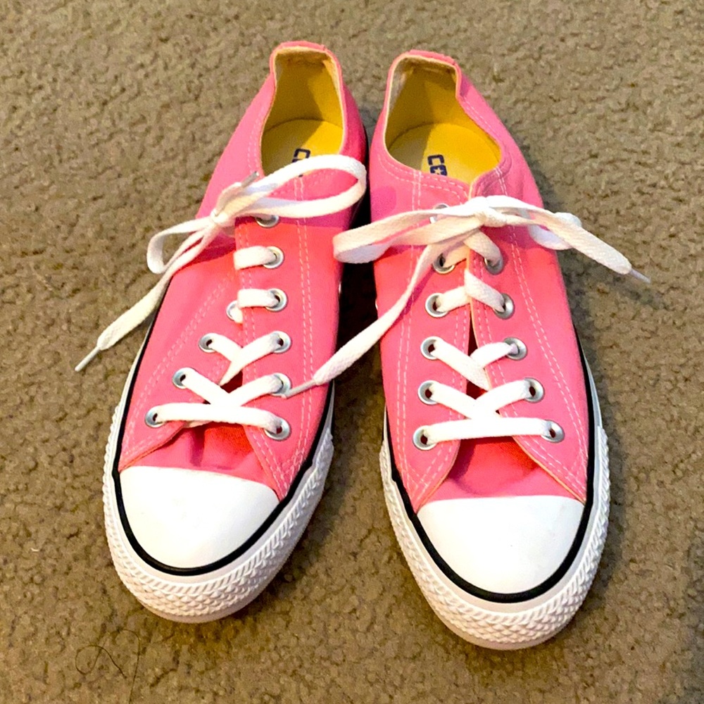 Bright pink converse low tops